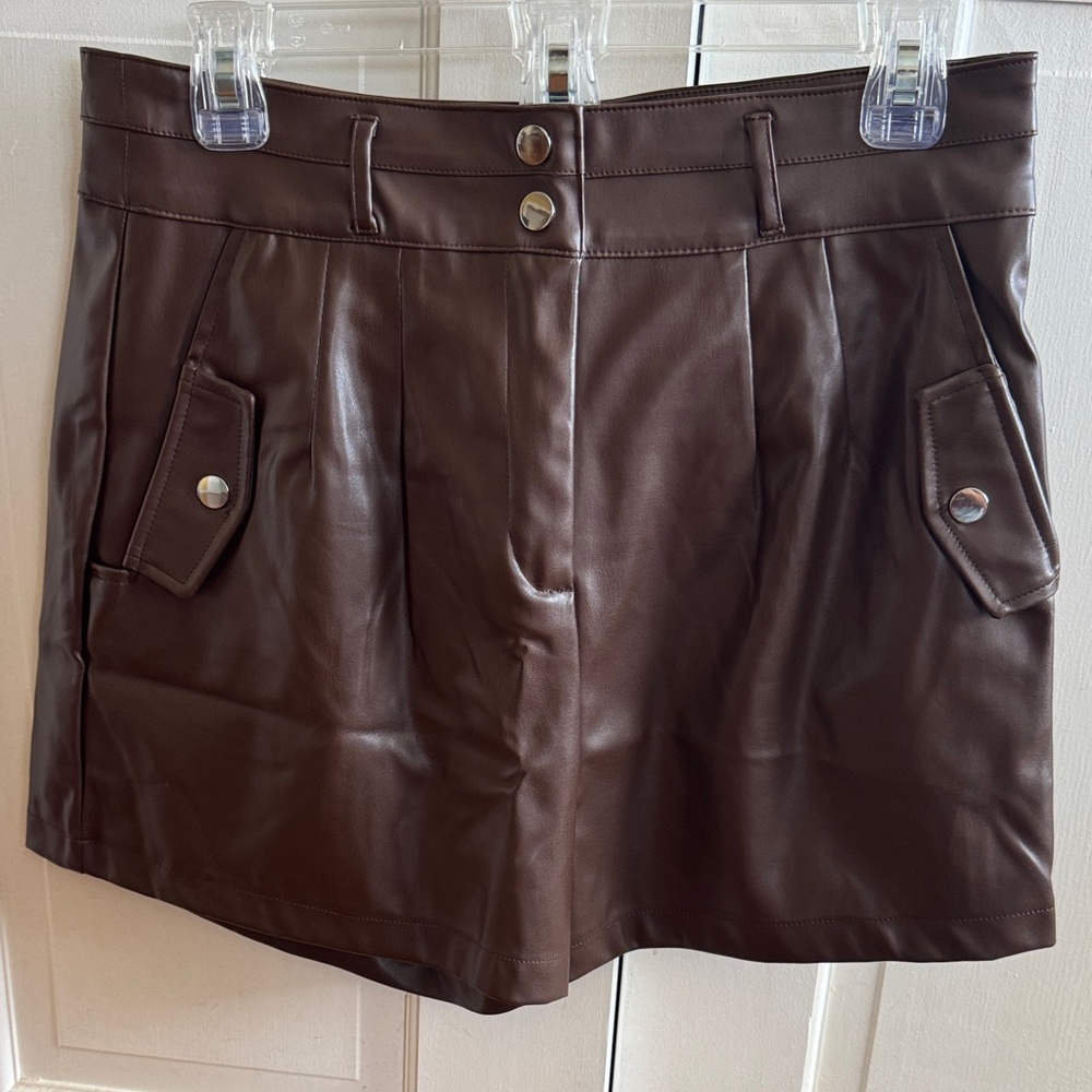 Shop Priceless Boutique Brown vegan Leather Shorts, shown in  photo
